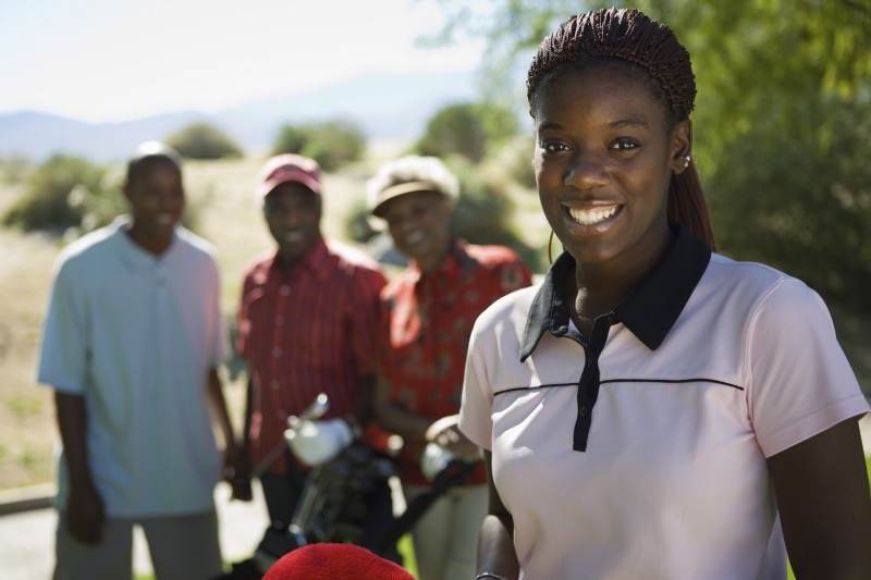 Woman Golfing with Family